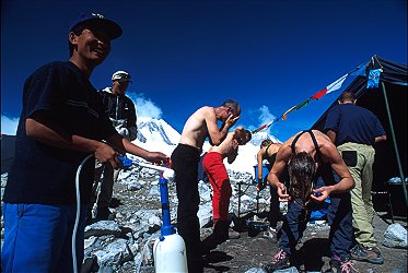 [CleaningUp.jpg]
Back from the high camps, a general clean up on a sunny day with a pump shower activated by Purba, the Sirdar.