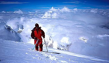 [SummitPlateau.jpg]
Me upon reaching the summit plateau at about 8000m asl. Notice how deep the snow is ? (Photo Francesco Martinelli)