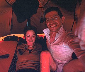 [InTentCamp1.jpg]
Jenny and I inside one of the 3-person tent at Camp 1. Those tents were resistant (resistent?) but heavy and dark inside. The fabric would cover with ice every night.