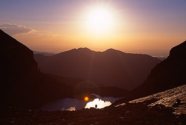 [ChiasmLake.jpg]
Sunrise on Chasm Lake as seen from the base of the Diamond
