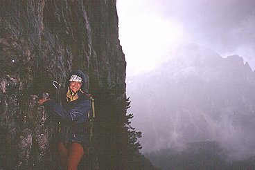 [RainOn.jpg]
Jenny rappelling down Torre Venezia in a rainstorm, Dolomite