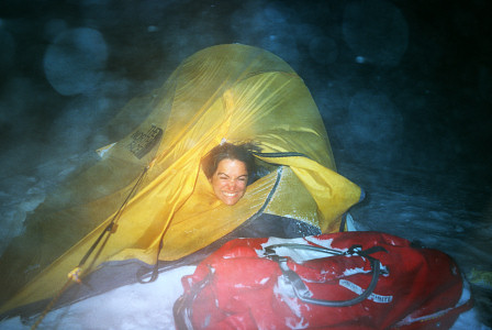 [NightStorm.jpg]
Jenny holding to the tent in a fierce 3 day long winter storm in northern Sweden.