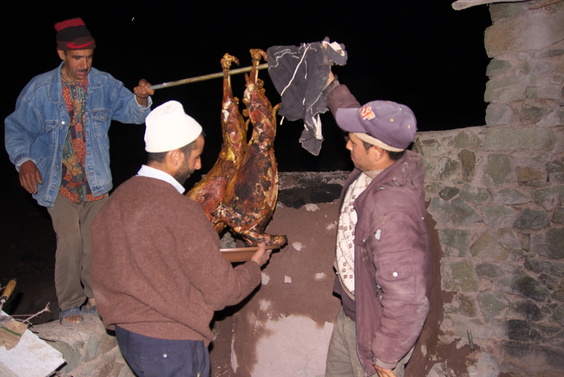 [20120504_223749_Mechoui.jpg]
Getting the sheep out of the oven.