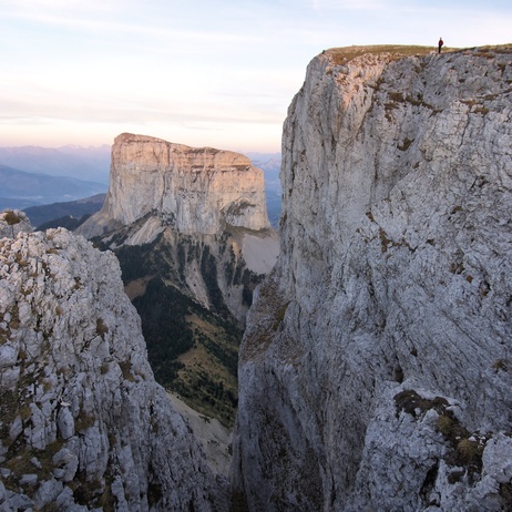 [20071016_184238_MtAiguillePano_.jpg]
A tiny spec of a hiker gives a sense of scale to the ridge of the Vercors and Mt Aiguille.