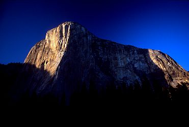 [ElCapSunset.jpg]
Sunset on El Capitan, with the East Ridge in the sunny part in the right. The Moratorium is hidden in the shade below.