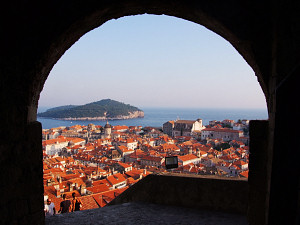 The old town of Dubrovnik seen through one of the fortress towers