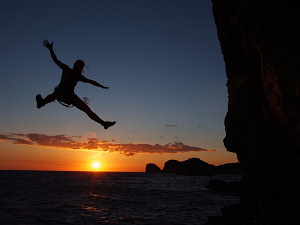Sunset dive off the cliff