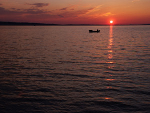 A fisherman's boat in the sunset on the dalmatian coast