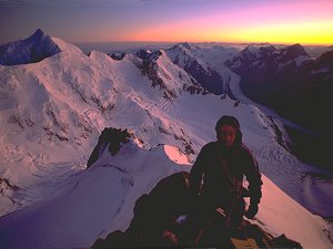 Early arrival at summit rocks, below the summit of Mt Cook (3764m)