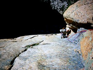 Brad near the crux of Astro Elephant. Elephant's Perch, Sawtooth Mountains