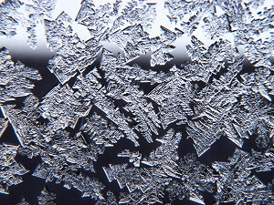 Ice crystals growing on a window