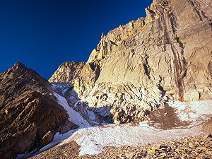 3 climbers up Lamb Slide, east face of Longs Peak