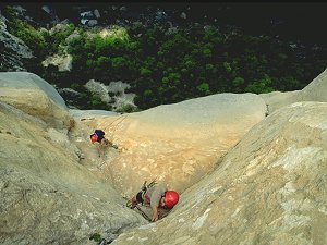 Lionel leading the overhanging crux (6b) of Roumagaou