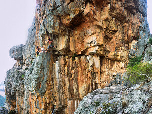 Climbers tackling the exposed start of Scorpion (Arapiles)