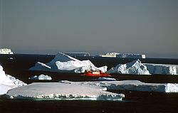 AstrolabeBetweenIcebergs - Astrolabe passing between icebergs, Antarctica