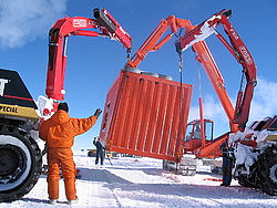 20050203_09_ContainerUnloading - Unloading a container from a sled after arrival of the Traverse at Dome C.
[ Click to go to the page where that image comes from ]