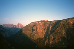 HalfDomeSentinel2 - Sun setting over Half Dome and the sentinel. Notice the shadow of El Capitan. Yosemite, California, 2003
[ Click to go to the page where that image comes from ]