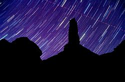 CastletonNight - Stars on Castleton tower, Moab, Utah
[ Click to download the free wallpaper version of this image ]