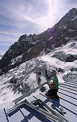 20060610_BoccalatteRoofRepairVPano - Repairs on the roof of the Boccalatte hut, Mt Blanc.
[ Click to go to the page where that image comes from ]