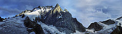 MeijeEveningPano_ - Last ray of sunlight on the summit of La Meije (3983m), Oisans.
[ Click to go to the page where that image comes from ]