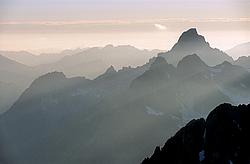MultipleSummitsEvening2 - Multiple summits ridges seen at dusk, Alps.
