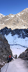 20070204-LarmesDuChaosVPano_ - Jenny finishing up 'Les larmes du Chaos' in the Vallon du Diable. The other side of the valley is south facing and the ice there looked about as solid as your average meringue.
[ Click to go to the page where that image comes from ]