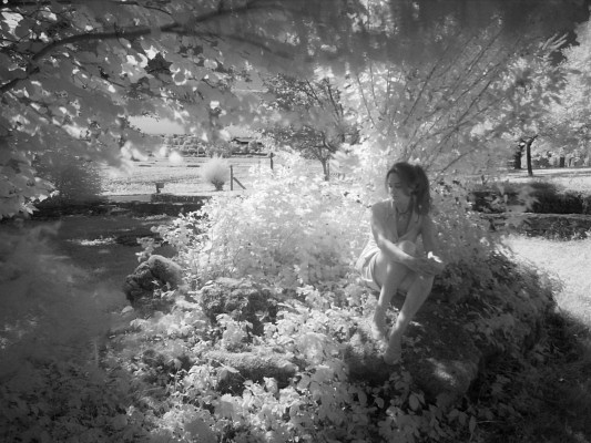[20080622_161205_Infrared.jpg]
Jenny taking the pause on a patch of wild strawberries. Light coming from the back with tree branch overhead.